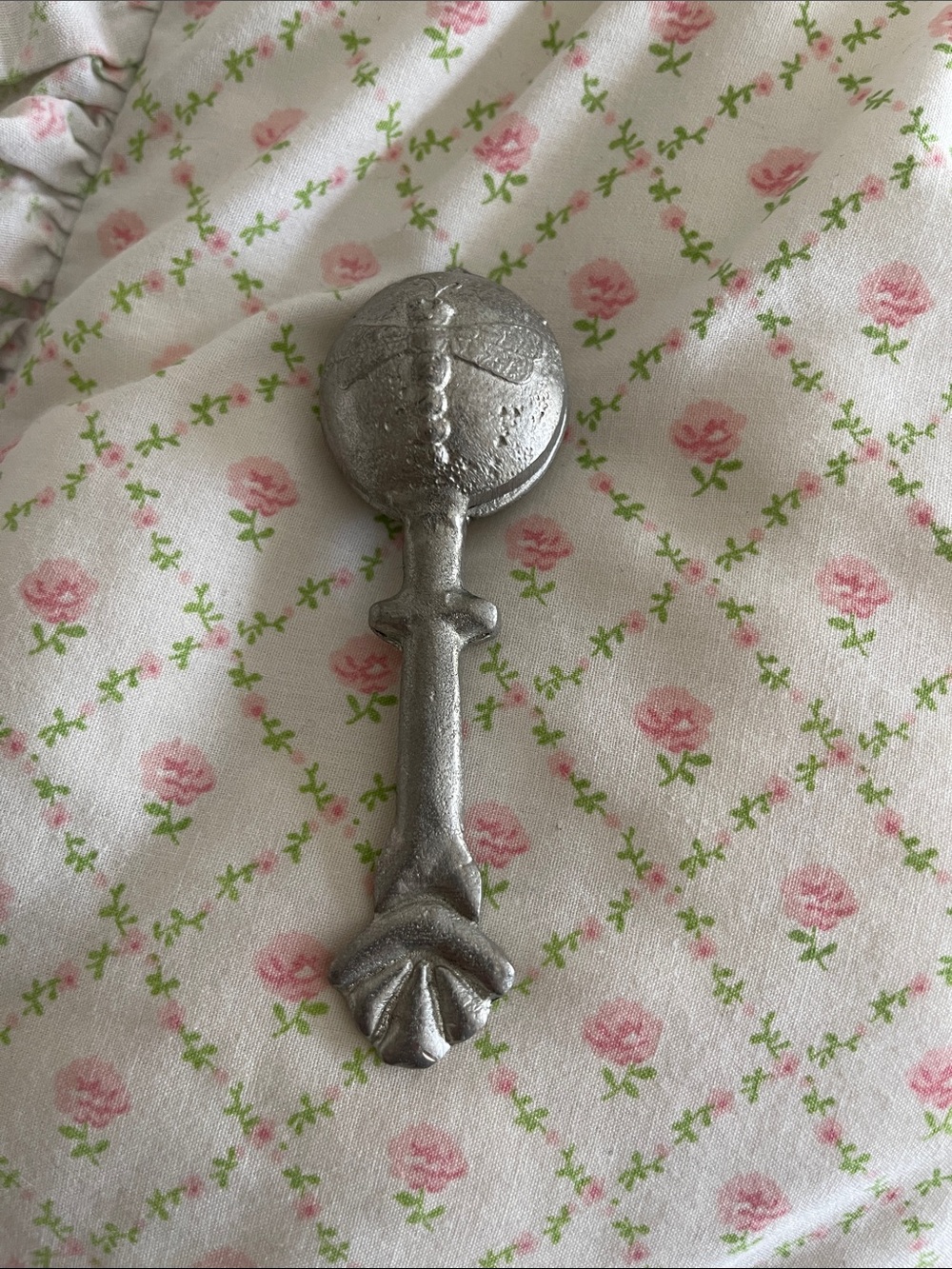 Pewter baby rattle signed